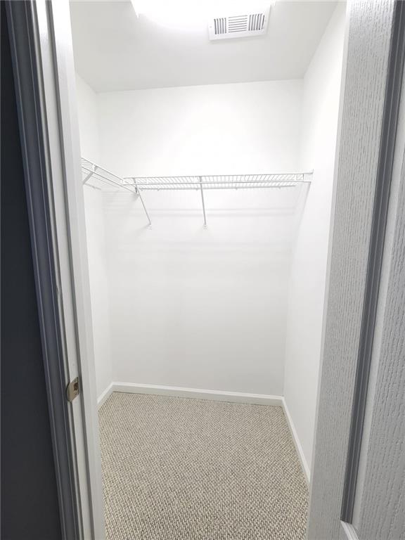 5520 Casey Valley Way Cumming, GA 30040 - Photo 20 of 25 a view of small space with racks on the wall