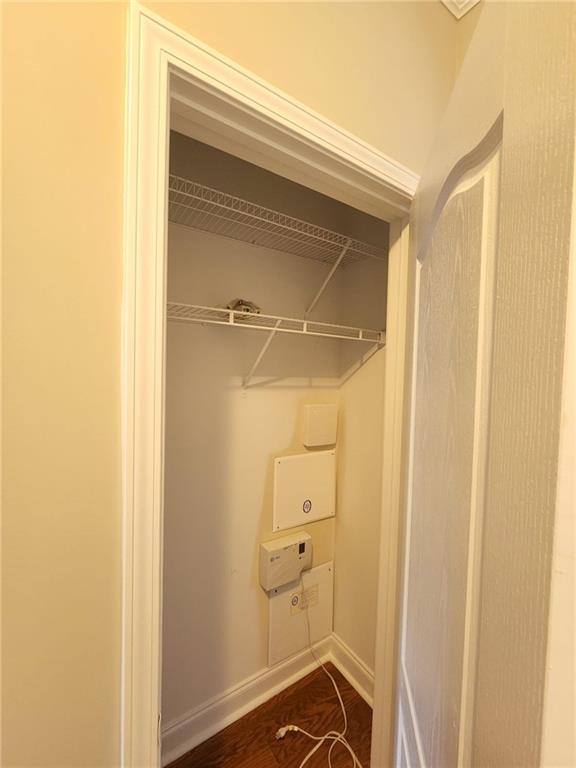 5520 Casey Valley Way Cumming, GA 30040 - Photo 4 of 25 a bathroom with a glass shower door