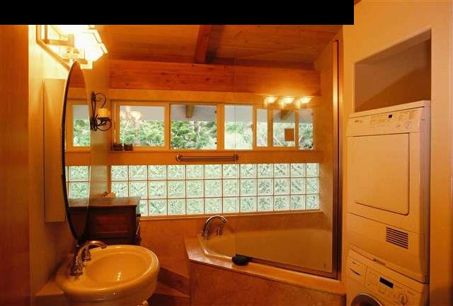 646 Awalau Road Haiku, HI 96708 - Photo 12 of 28 a bathroom with a toilet and a sink