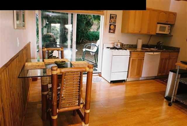 646 Awalau Road Haiku, HI 96708 - Photo 18 of 28 a view of a kitchen with appliances and workspace