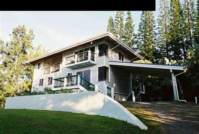 646 Awalau Road Haiku, HI 96708 - Photo 23 of 28 a front view of a house with a yard