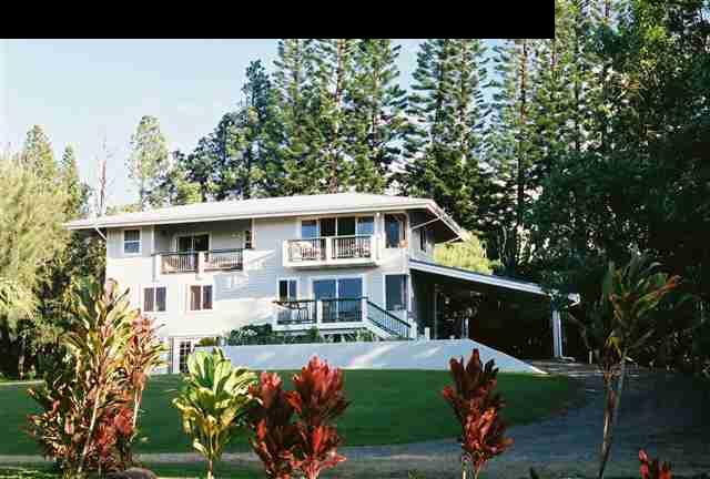 646 Awalau Road Haiku, HI 96708 - Photo 3 of 28 a front view of a house with a yard