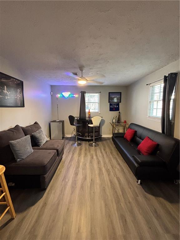 4949 Penscot Way Stone Mountain, GA 30088 - Photo 16 of 40 a living room with furniture and a couch