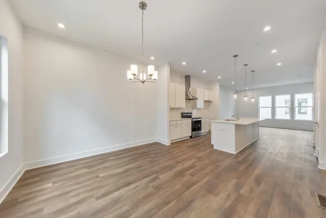 a view of a kitchen and a window