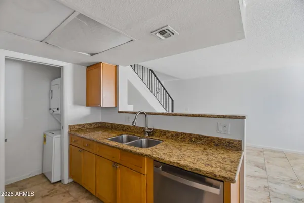 a utility room with washer and dryer