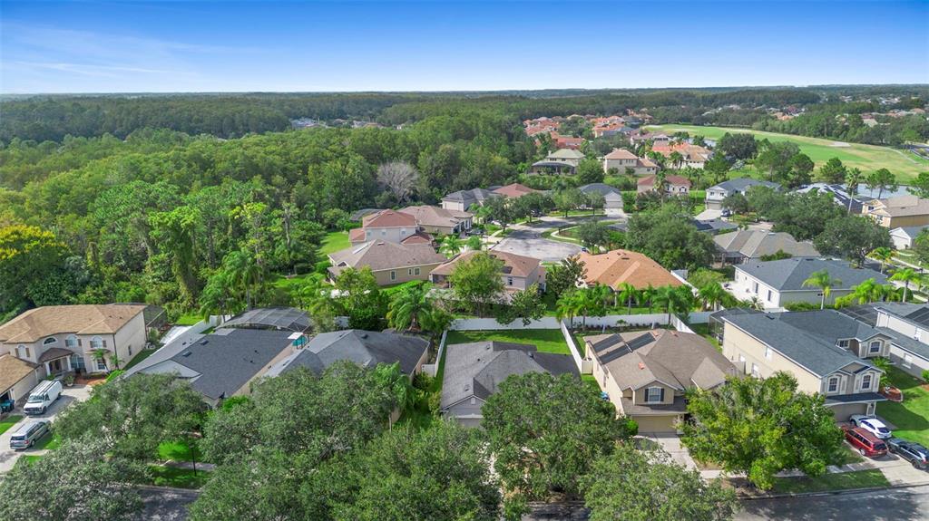 2414 Ridgemoor Drive Orlando, FL 32828 - Photo 14 of 45 an aerial view of a house with garden