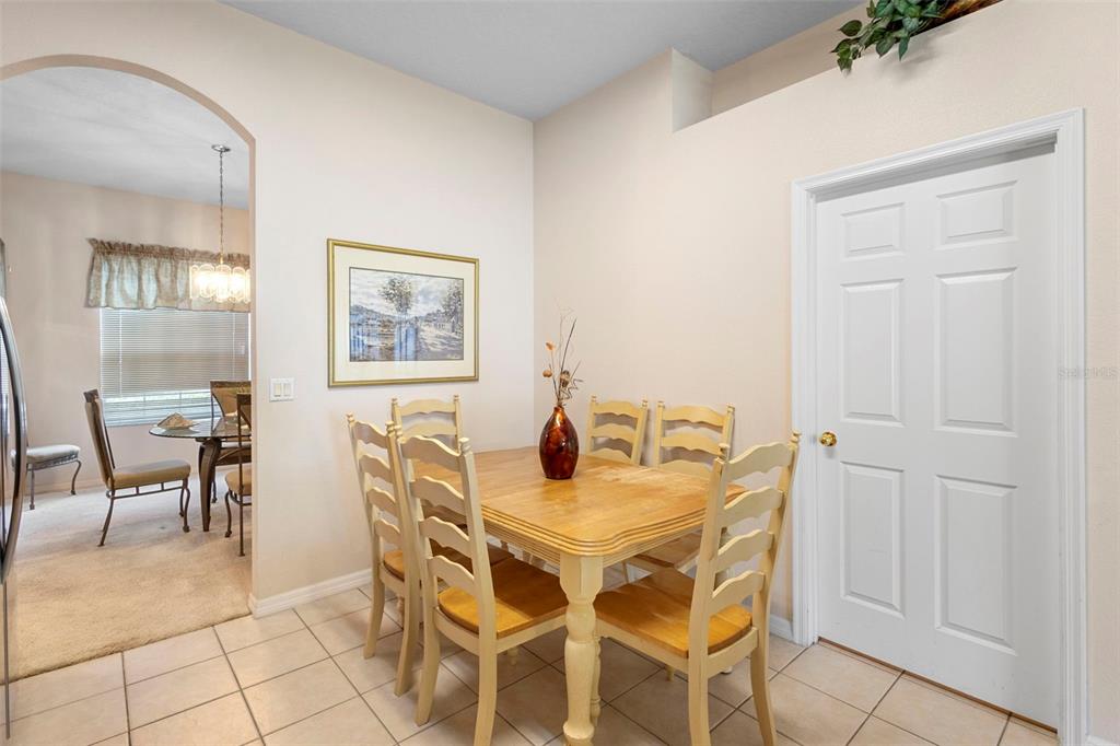 2414 Ridgemoor Drive Orlando, FL 32828 - Photo 20 of 45 a dining room with furniture and window