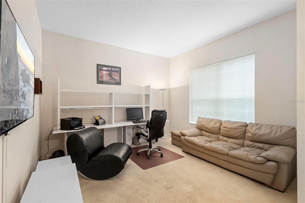 2414 Ridgemoor Drive Orlando, FL 32828 - Photo 27 of 45 a living room with furniture