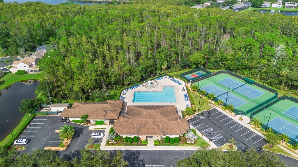 2414 Ridgemoor Drive Orlando, FL 32828 - Photo 41 of 45 an aerial view of a house with a yard