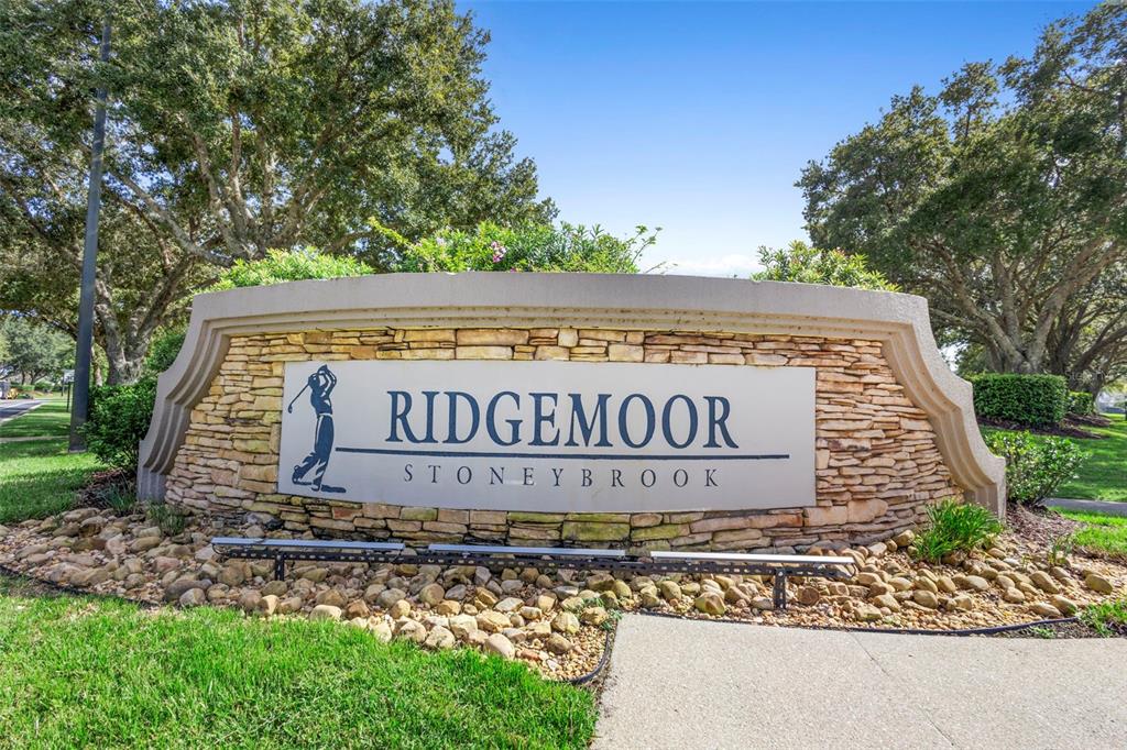 2414 Ridgemoor Drive Orlando, FL 32828 - Photo 45 of 45 a sign on the side of a building