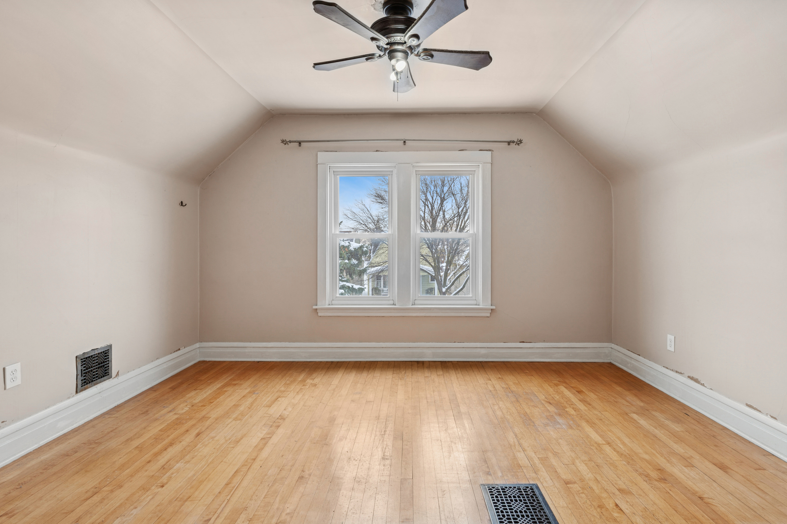 5218 West Patterson Avenue Chicago, IL 60641 - Photo 17 of 29 a view of room with window ceiling fan and wooden floor
