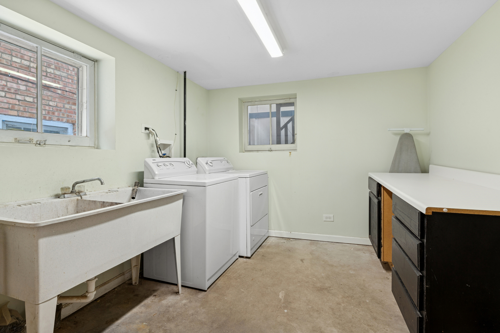 5218 West Patterson Avenue Chicago, IL 60641 - Photo 22 of 29 a bathroom with a sink and a mirror