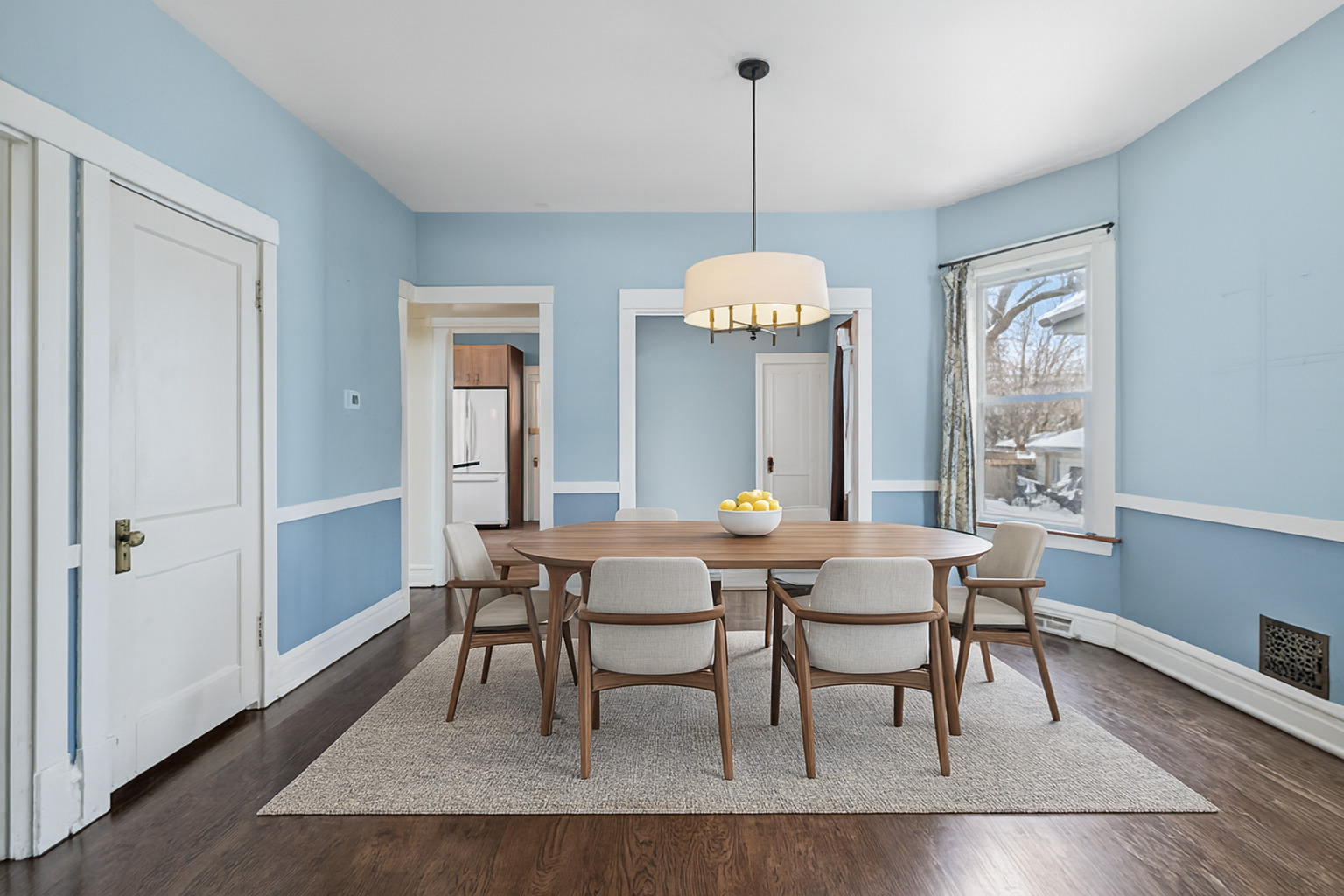 5218 West Patterson Avenue Chicago, IL 60641 - Photo 6 of 29 a view of a dining room with furniture window and wooden floor