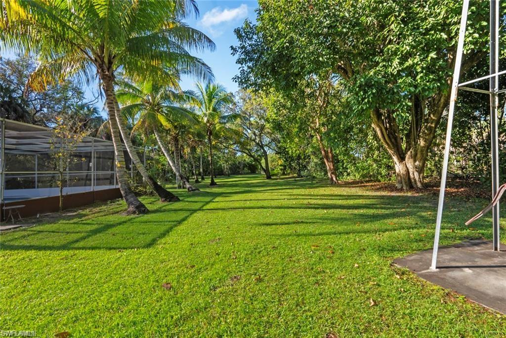 3550 Hazel Road Naples, FL 34104 - Photo 33 of 43 a view of a park with large trees