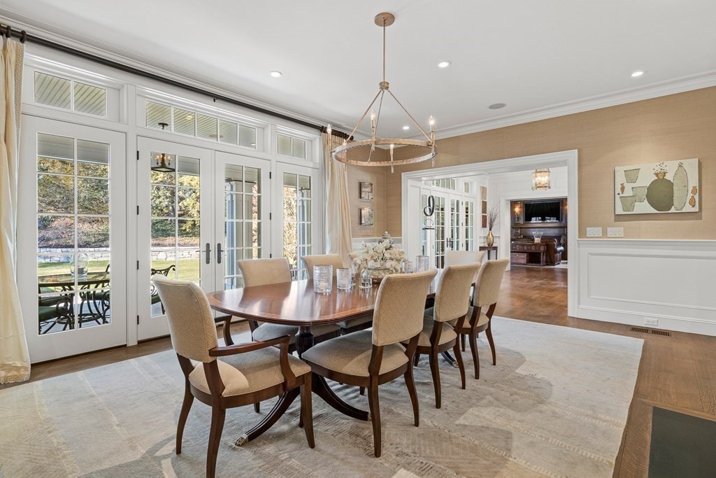 15 Valley Road Wellesley, MA 02481 - Photo 12 of 42 a view of a dining room with furniture window and wooden floor