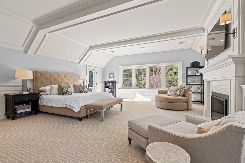 15 Valley Road Wellesley, MA 02481 - Photo 22 of 42 a spacious bedroom with furniture and a fireplace
