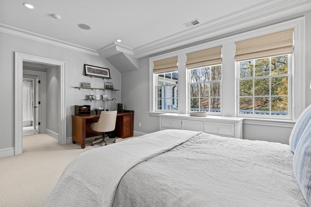 15 Valley Road Wellesley, MA 02481 - Photo 25 of 42 a bedroom with a bed and a large window