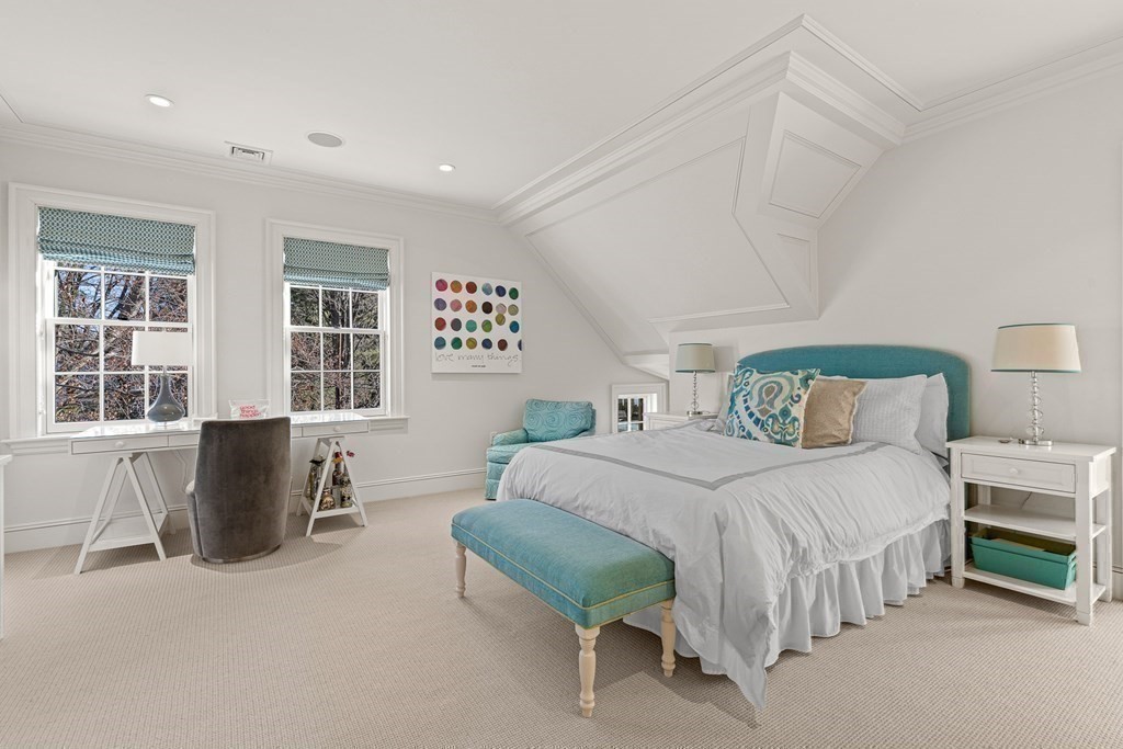 15 Valley Road Wellesley, MA 02481 - Photo 26 of 42 a bedroom with a bed and a couch