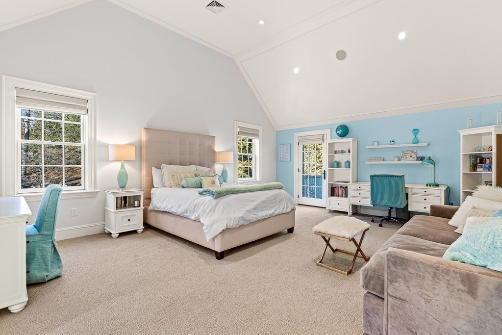 15 Valley Road Wellesley, MA 02481 - Photo 27 of 42 a bedroom with a bed and a couch