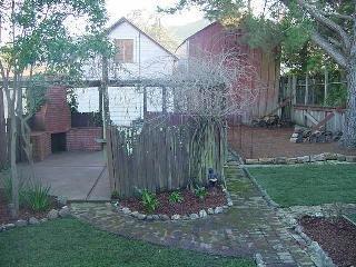 29 Ross Street San Rafael, CA 94901 - Photo 3 of 5 a view of a backyard with plants and large trees
