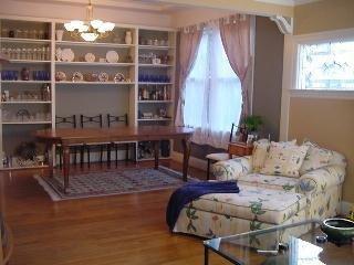 29 Ross Street San Rafael, CA 94901 - Photo 5 of 5 a living room with furniture a chandelier and a large window