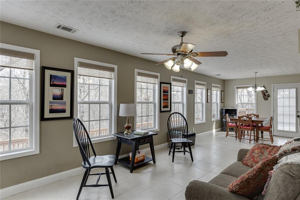 124 Edgewater Court Braselton, GA 30517 - Photo 12 of 54 a view of a livingroom and dining room