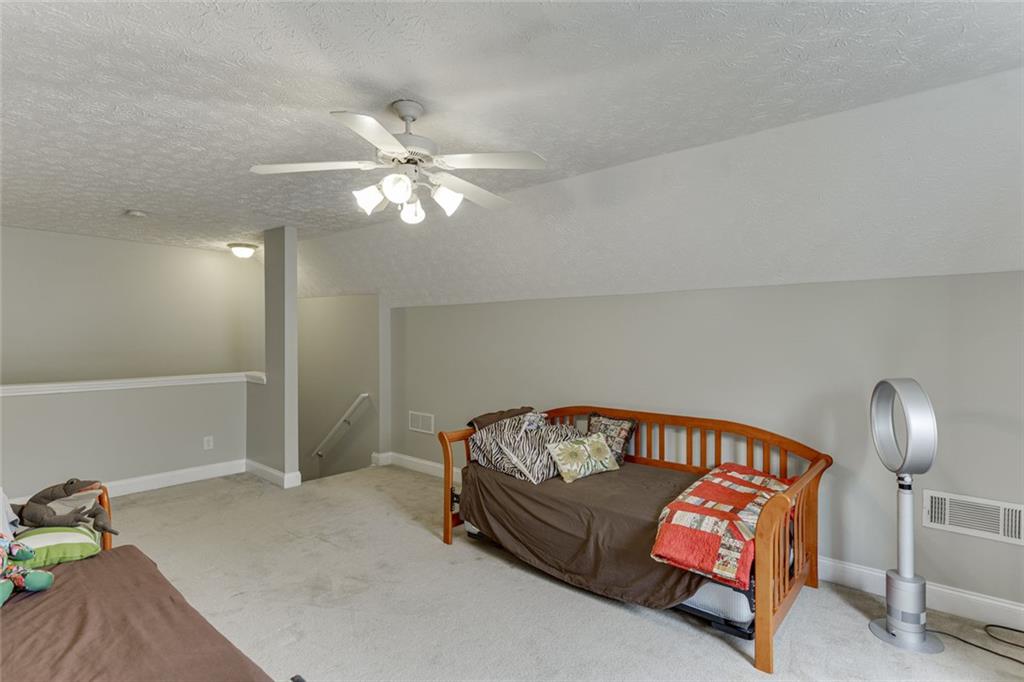 124 Edgewater Court Braselton, GA 30517 - Photo 33 of 54 a living room with furniture
