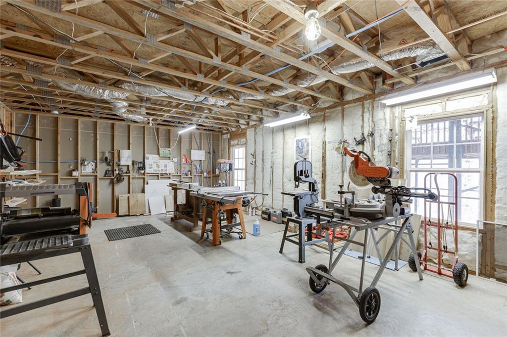 124 Edgewater Court Braselton, GA 30517 - Photo 42 of 54 a view of a room with gym equipment