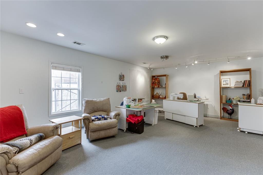 124 Edgewater Court Braselton, GA 30517 - Photo 43 of 54 a living room with furniture and window