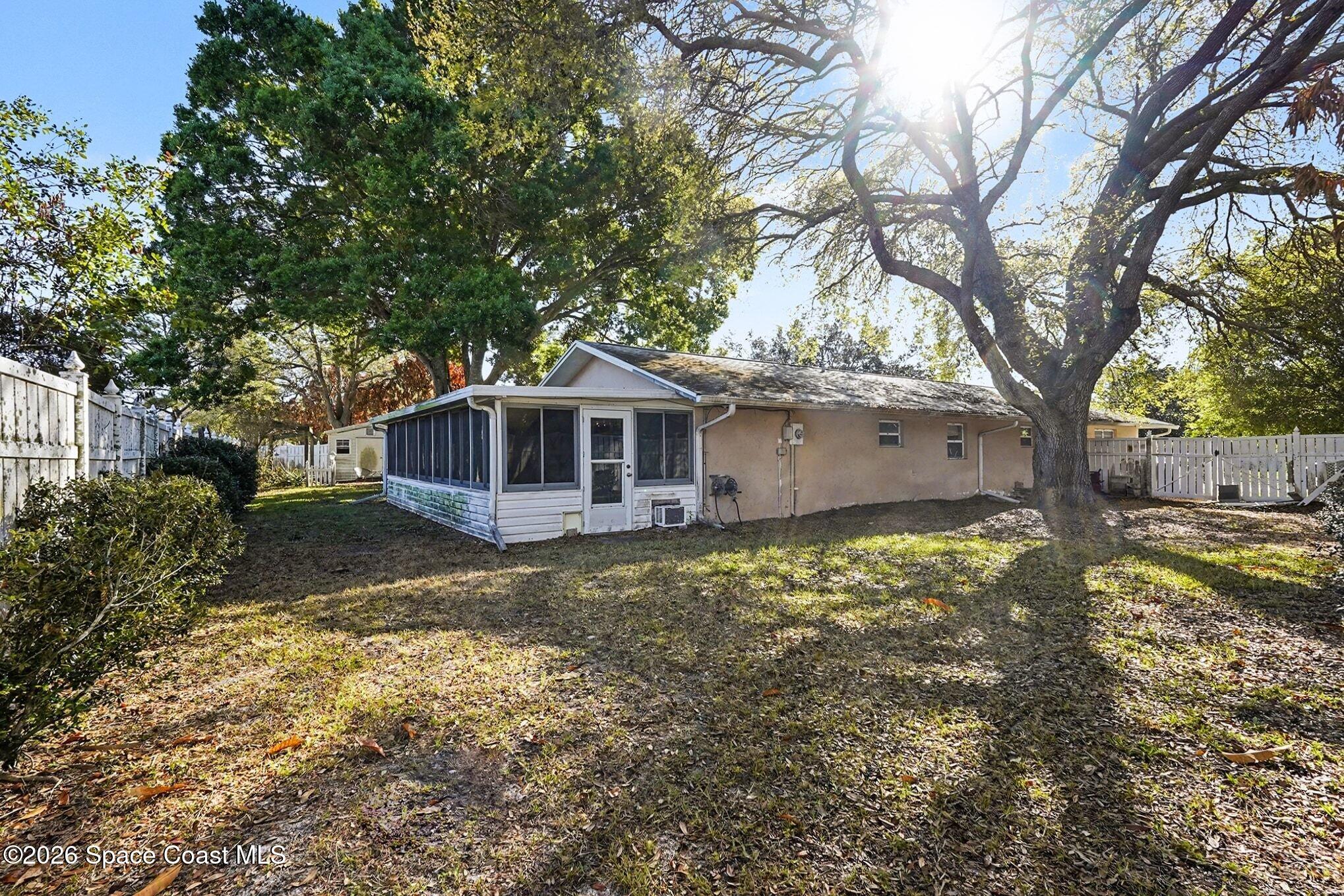 1351 Cherry Hills Road Northeast Palm Bay, FL 32905 - Photo 13 of 15 Fenced in Backyard