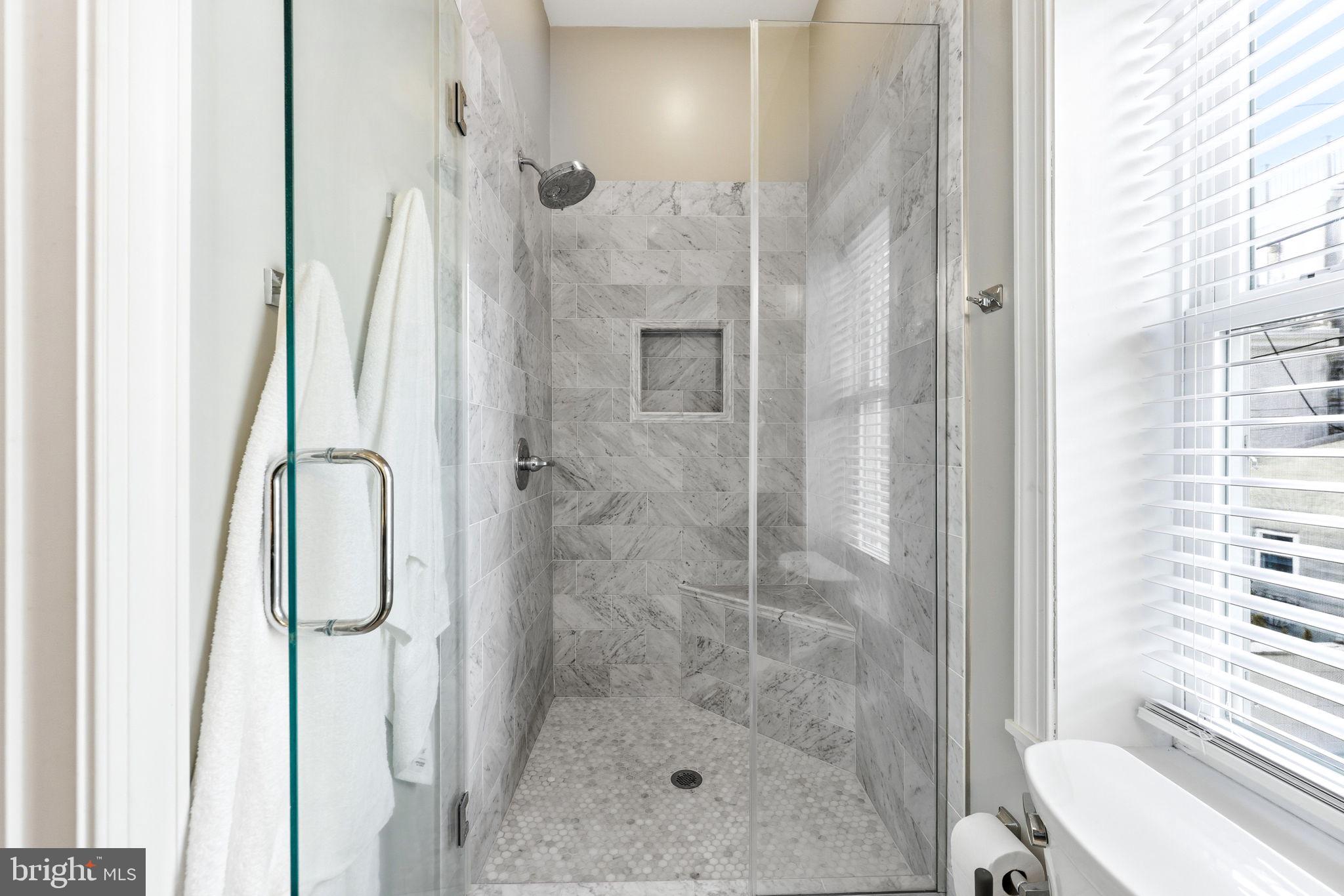 404 South Castle Street Baltimore, MD 21231 - Photo 29 of 47 a bathroom with a shower and a toilet