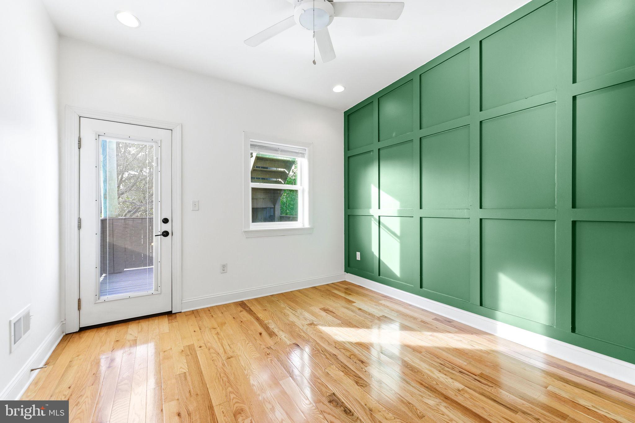 404 South Castle Street Baltimore, MD 21231 - Photo 33 of 47 a bedroom with a bed and a window