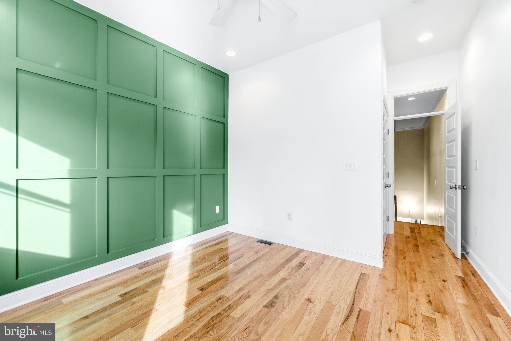 404 South Castle Street Baltimore, MD 21231 - Photo 34 of 47 a view of a room with wooden floor