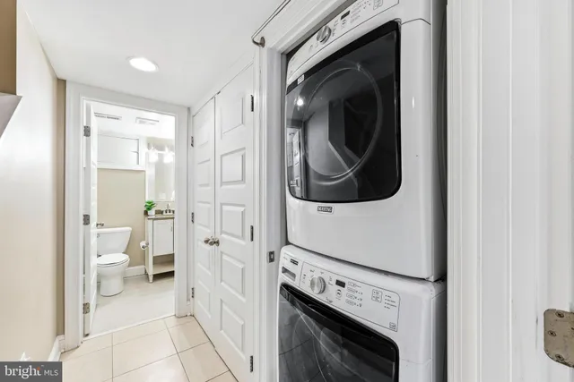 a view of entryway with wooden floor and stairs