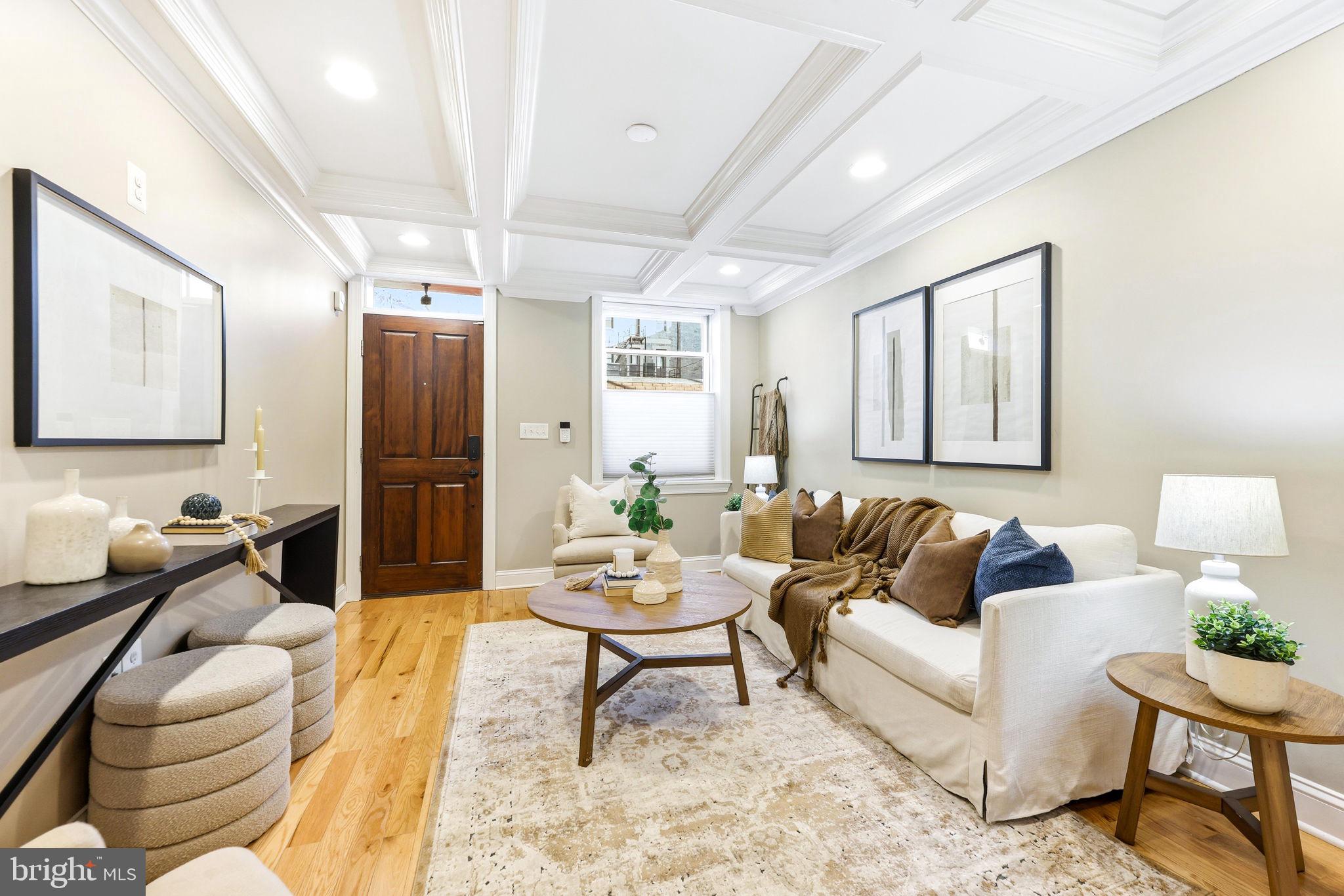 404 South Castle Street Baltimore, MD 21231 - Photo 6 of 47 a living room with furniture and a wooden floor