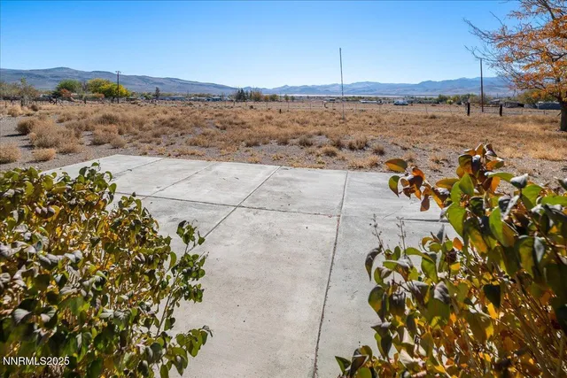 a view of houses with a road