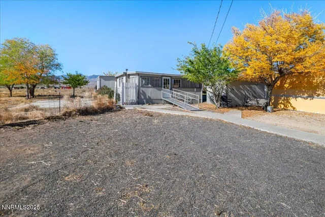 front view of a house with a snow
