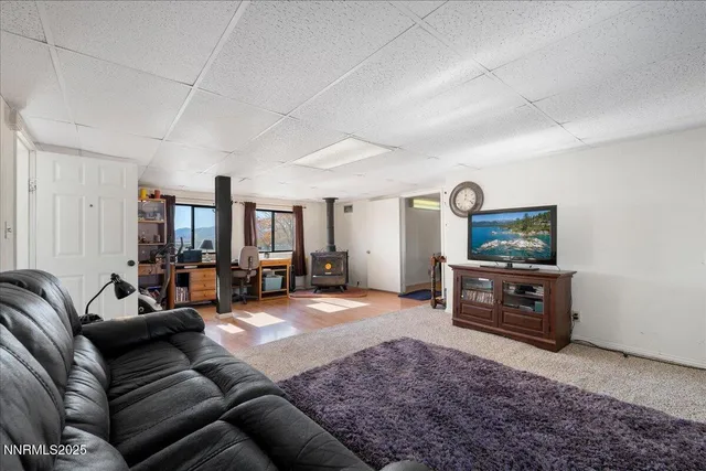 a room with furniture and a fireplace