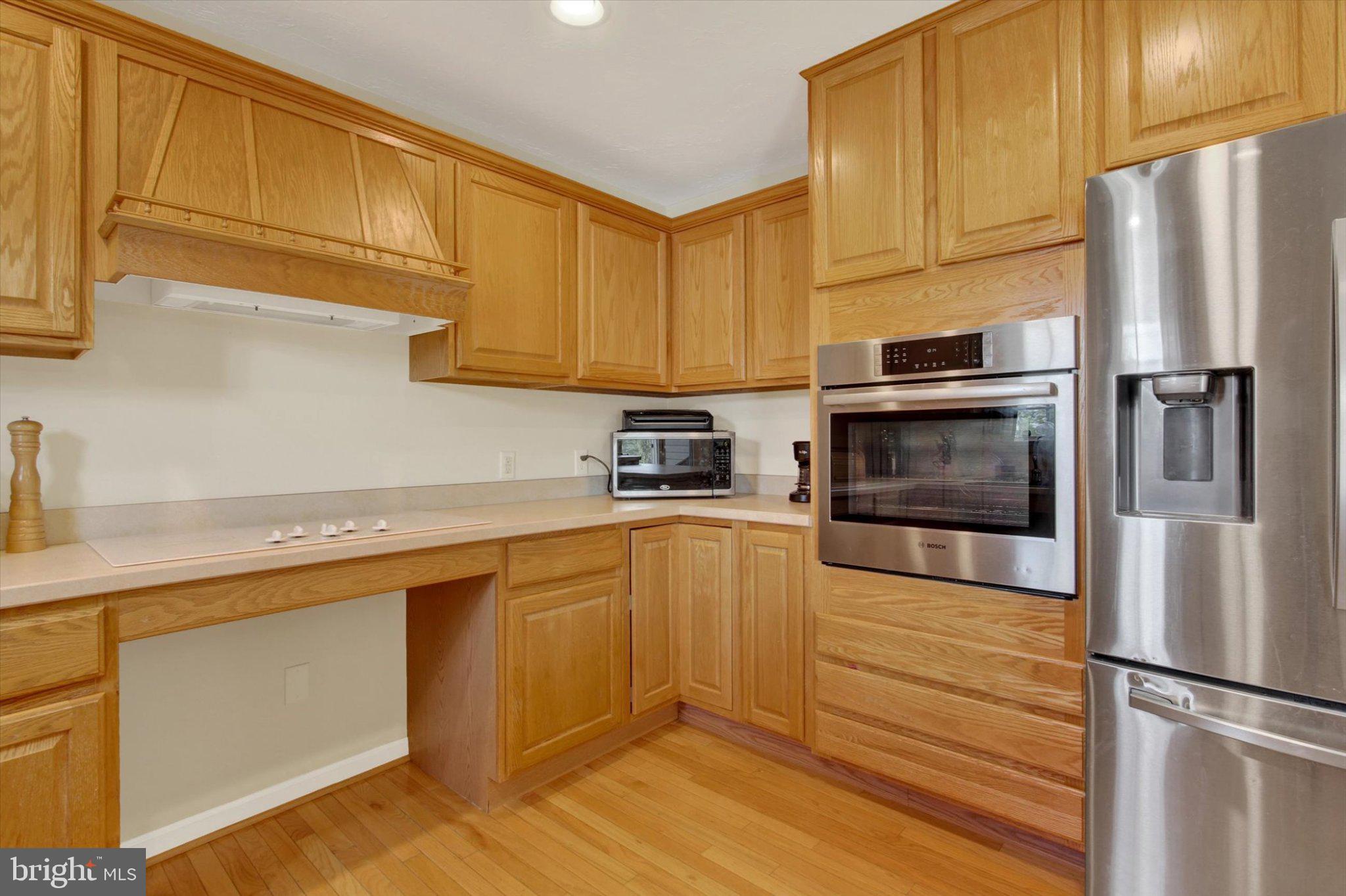 239 Race Horse Road Hanover, PA 17331 - Photo 10 of 24 Warm wood tones in a modern kitchen.