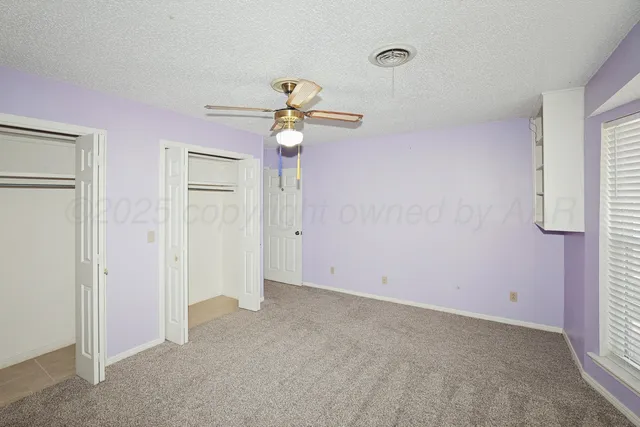 a bathroom with a bathtub and a sink