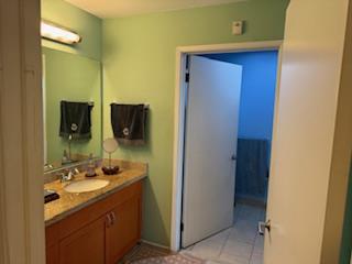 821 Folsom Street, Unit 217 San Francisco, CA 94107 - Photo 13 of 15 a bathroom with a double vanity sink and mirror