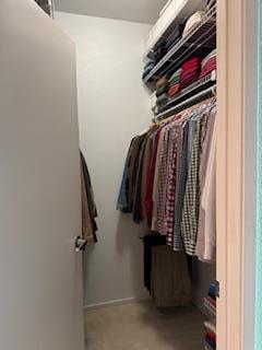 821 Folsom Street, Unit 217 San Francisco, CA 94107 - Photo 7 of 15 a view of walk in closet with clothes and shoes