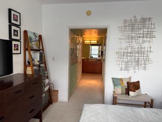 821 Folsom Street, Unit 217 San Francisco, CA 94107 - Photo 10 of 15 a living room with furniture and a window