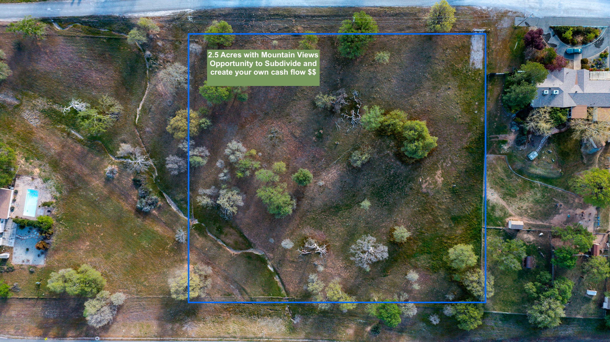 1090 Gibralter Road Redding, CA 96003 - Photo 6 of 10 a sign that is in front of flowers