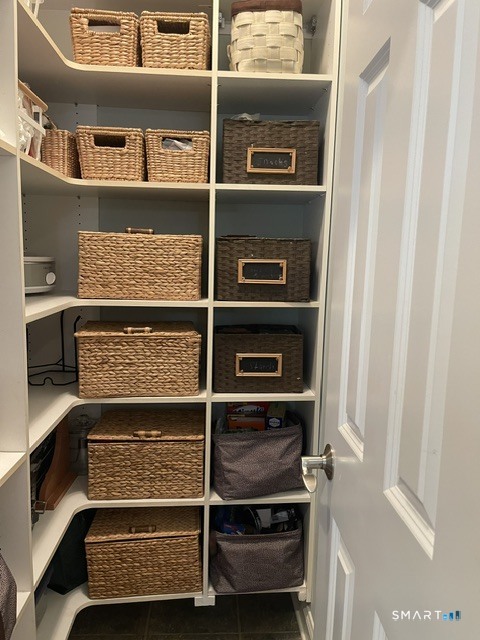4 Ortense Road Wallingford, CT 06492 - Photo 12 of 33 a view of walk in closet with clothes and shoes
