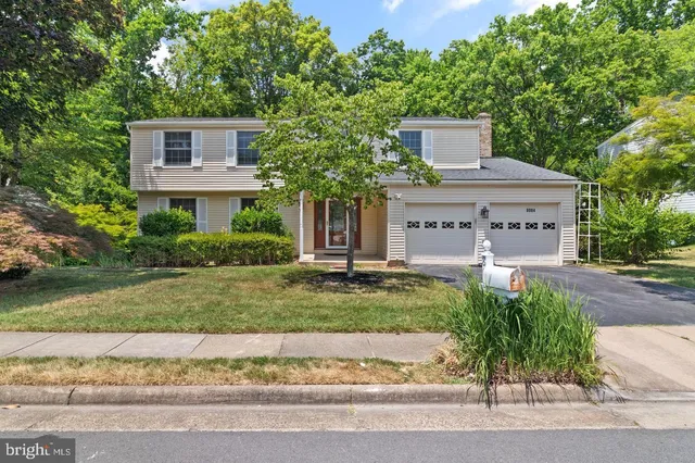 front view of a house with a garden