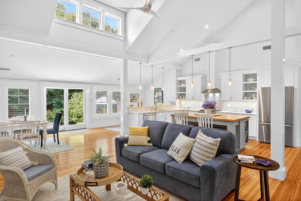 950 Massasoit Road, Unit 3 Eastham, MA 02642 - Photo 21 of 42 a living room with furniture and a large window