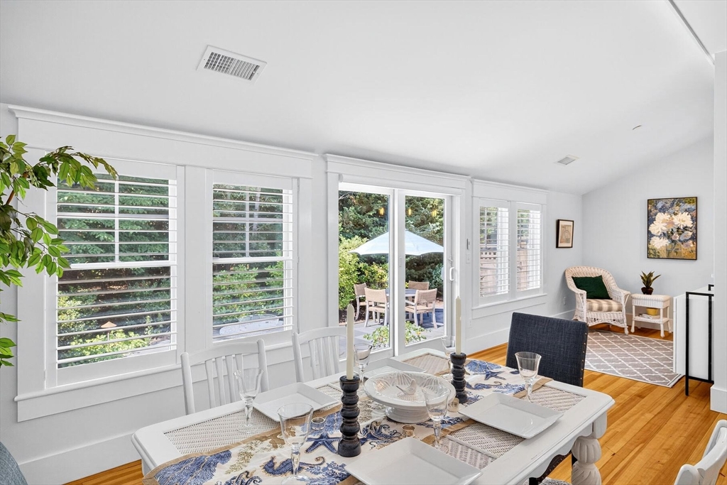 950 Massasoit Road, Unit 3 Eastham, MA 02642 - Photo 27 of 42 a living room with furniture and large windows
