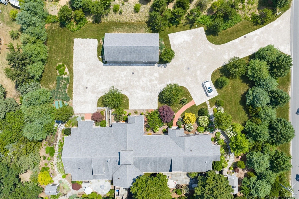 950 Massasoit Road, Unit 3 Eastham, MA 02642 - Photo 3 of 42 an aerial view of a house with yard