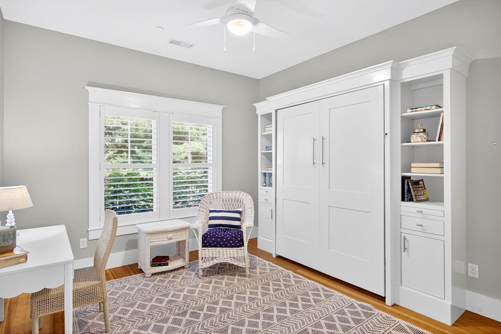 950 Massasoit Road, Unit 3 Eastham, MA 02642 - Photo 35 of 42 a living room with furniture and a window